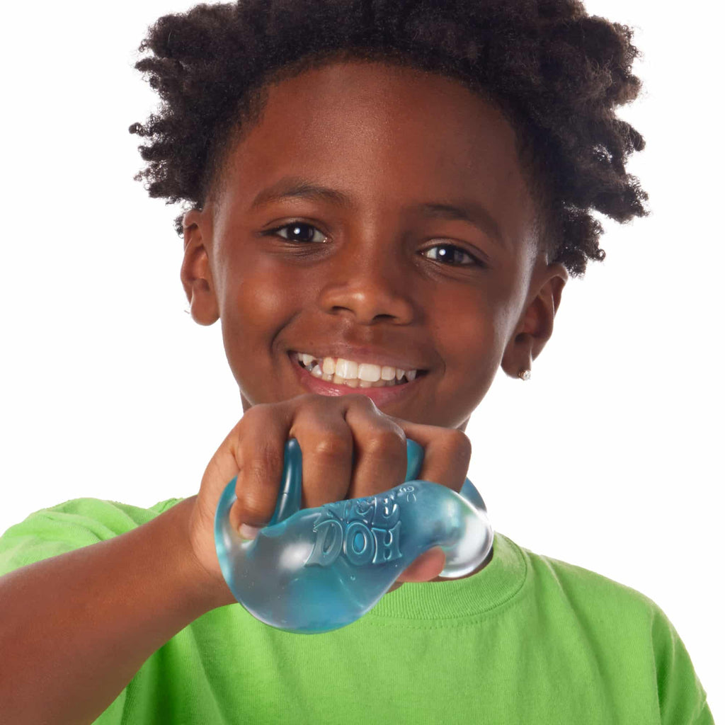 NeeDoh Nice Cube X2 Lifestyle of boy squeezing blue Nice Cube X2