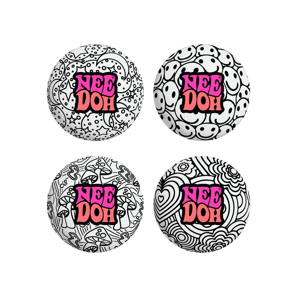 Four different black-and-white patterned NeeDoh Press-Doh C7 sensory squish balls. Patterns include mushrooms, smiley faces, flowers, and stars. Text on each reads "NeeDoh".